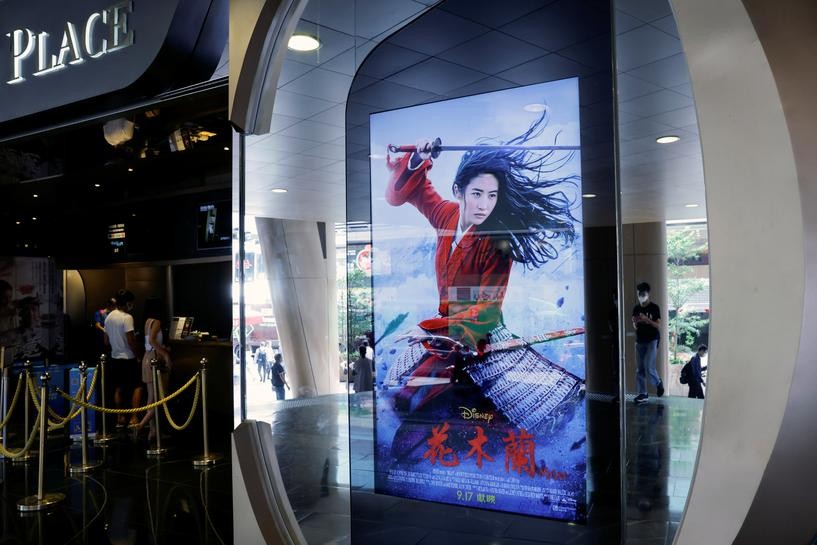 An advertisement for Walt Disney Co's live-action war movie "Mulan" is pictured at a cinema in Hong Kong, China on September 16. REUTERS/Tyrone Siu